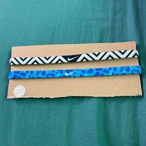 Two Nike athletic head bands